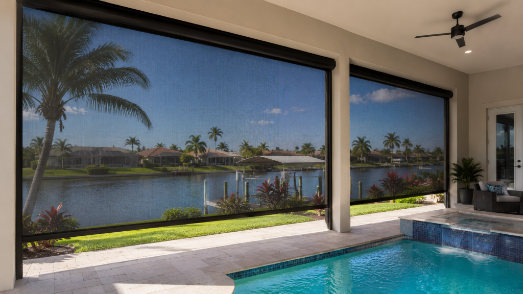 Motorized pool deck screen installed on a Southwest Florida lanai blocking insects and UV rays