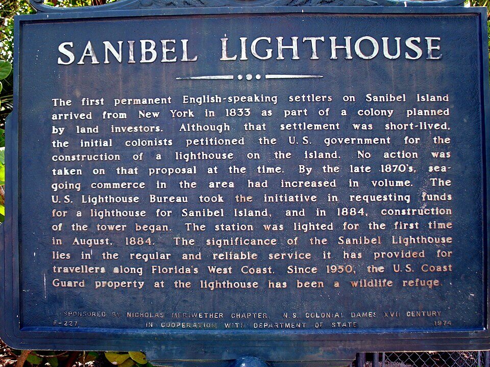 A bronze plaque with raised lettering titled Sanibel Lighthouse describes the history and significance of the lighthouse on Sanibel Island, Florida—much like how retractable awnings in Bradenton FL add character and function to historic coastal properties.