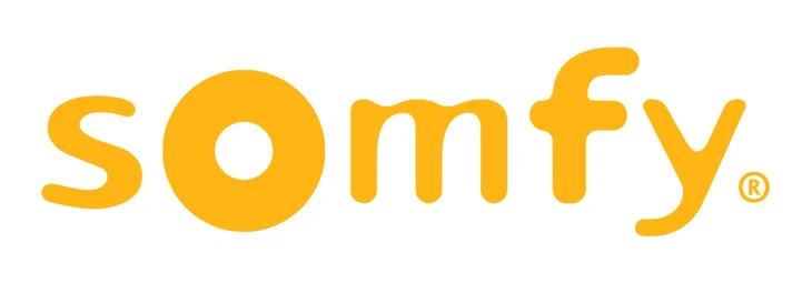 Somfy logo in lowercase, bold, rounded, yellow-orange letters on a white background. The letter o resembles a sun or eye.